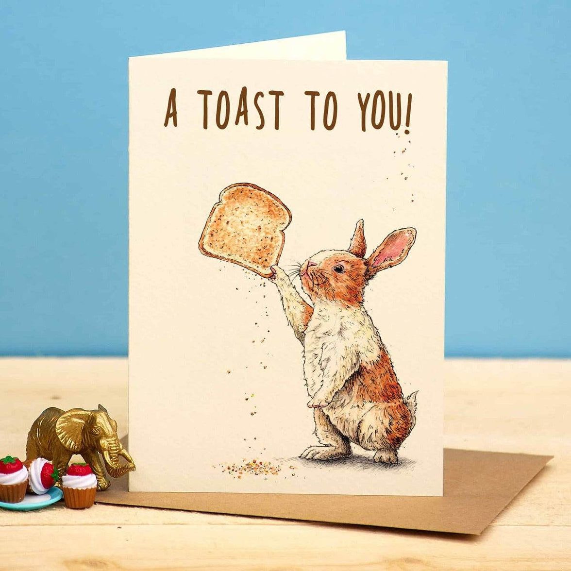 Toasting A Rabbit Funny Rabbit A Toast To You Birthday Card – Designed and Printed in the UK